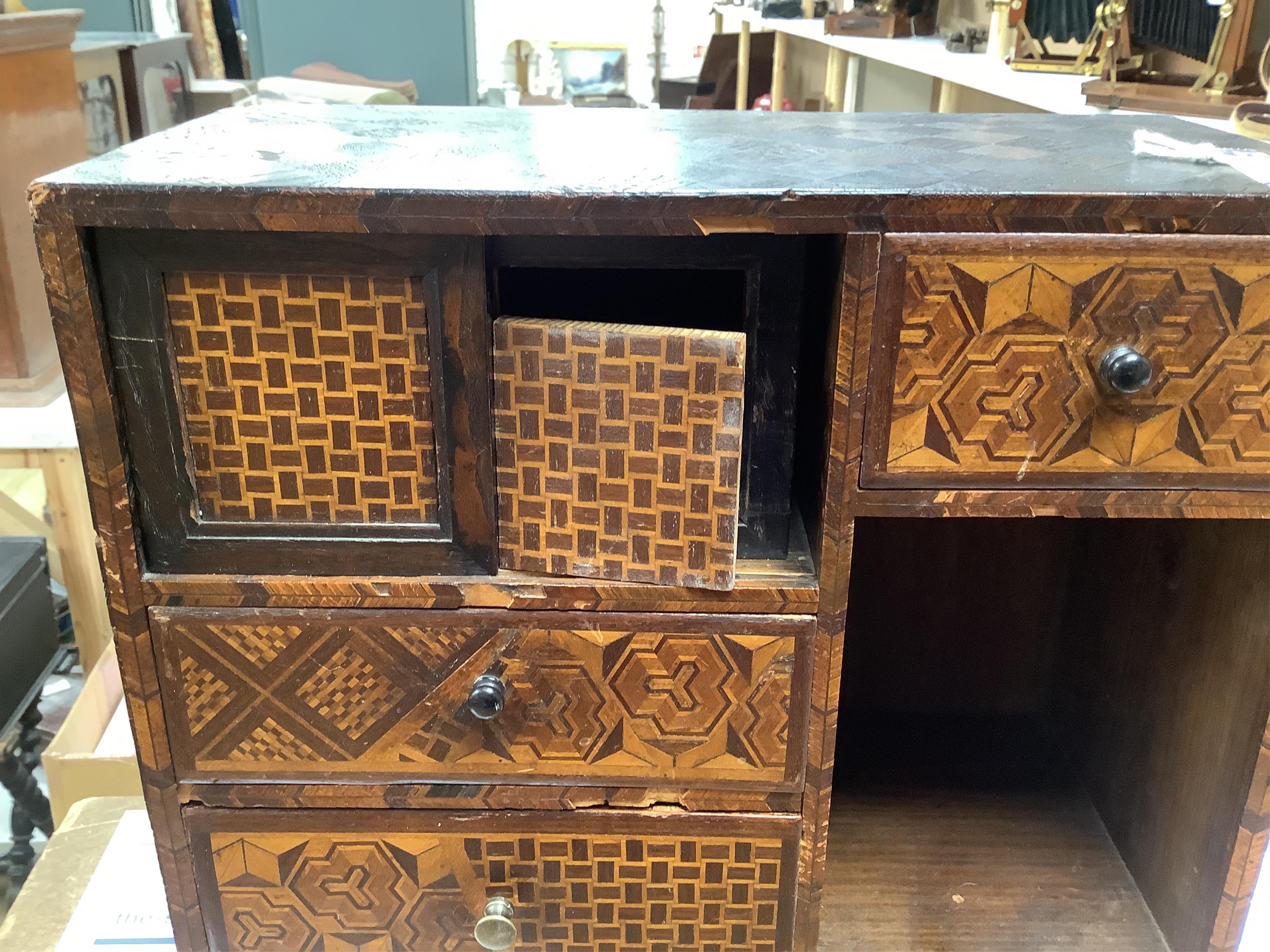 A late 19th century Japanese Hakone ware marquetry inlaid miniature cabinet, 34cm tall